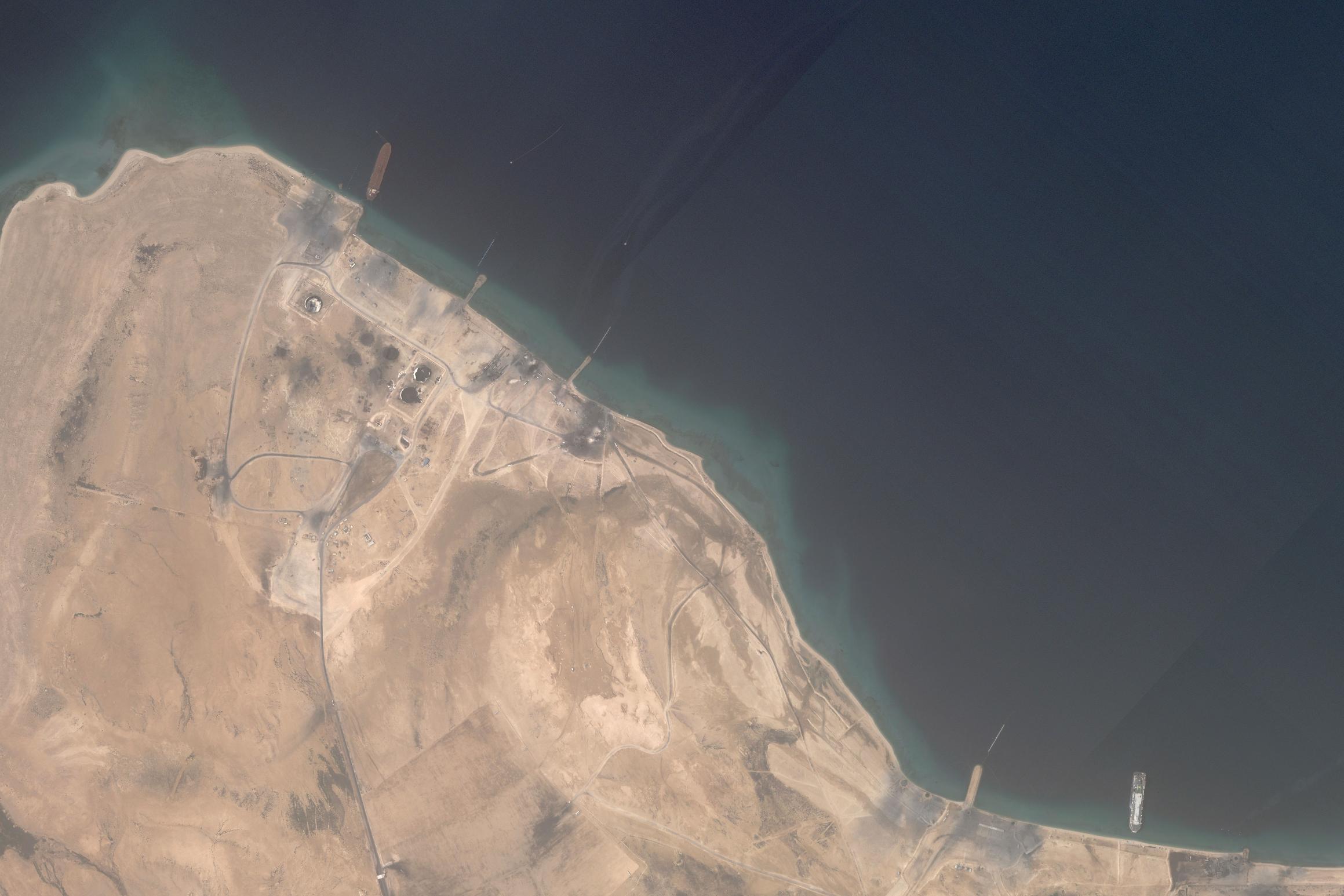 This satellite image from Planet Labs PBC shows the aftermath of U.S. airstrikes targeting the Ras Isa oil port in Yemen on Friday, April 18, 2025. (Planet Labs PBC via AP)