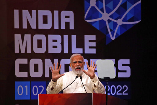 Indian Prime Minister Narendra Modi speaks at the launch of 5G services in India, in New Delhi, Saturday, Oct. 1, 2022. Modi launched the much-awaited services that aim to provide seamless coverage, high data rate, less delay in internet connectivity and highly reliable communications in presence of India’s telecom leaders in New Delhi, calling it a “step towards the new era.” (AP Photo)