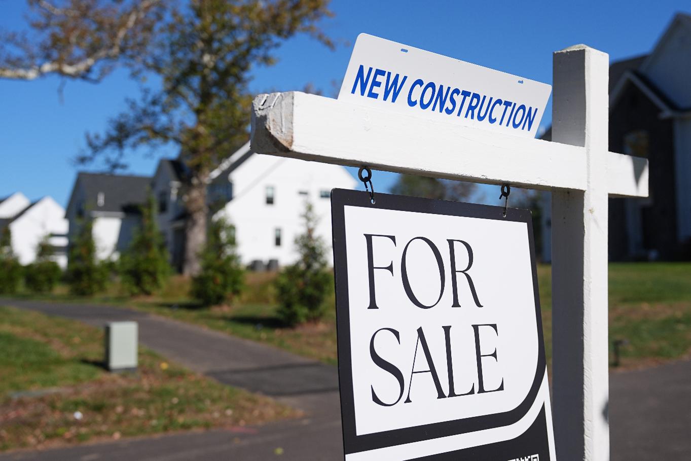 FILE - A sign is posted for a new home for sale in Ambler, Pa., Oct. 16, 2025. (AP Photo/Matt Rourke, File)
