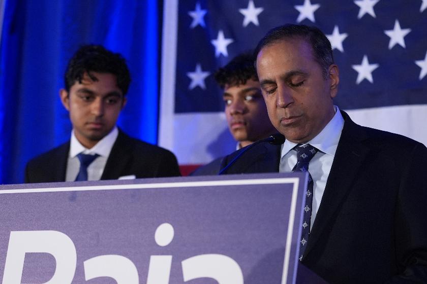 U.S. Rep. Raja Krishnamoorthi, D-Ill., right, concedes during an election night watch party after losing the Democratic primary for U.S. Senate Tuesday, March 17, 2026, in Chicago. (AP Photo/Nam Y. Huh)