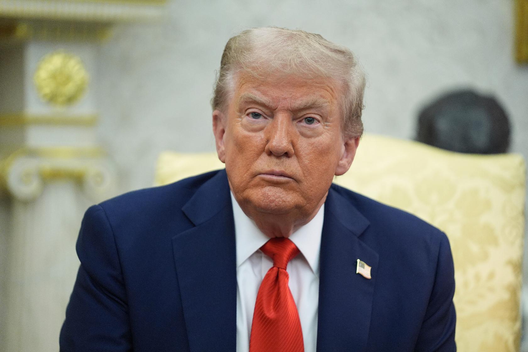 President Donald Trump listens during a meeting with Polish President Karol Nawrocki in the Oval Office of the White House, Wednesday, Sept. 3, 2025, in Washington. (AP Photo/Evan Vucci)