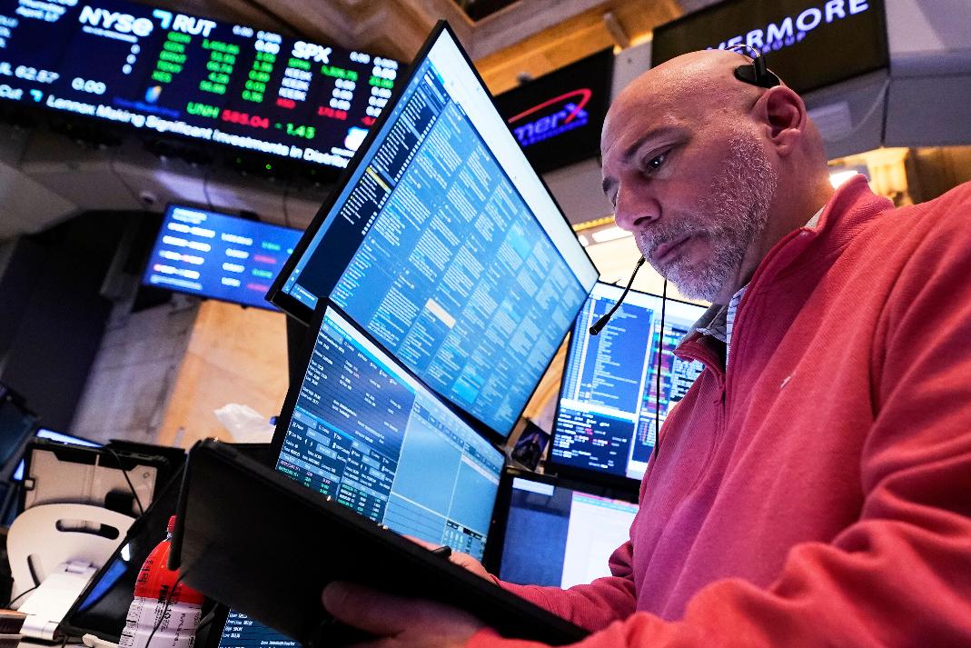 Trader Vincent Napolitano works on the floor of the New York Stock Exchange, Thursday, April 17, 2025. (AP Photo/Richard Drew)