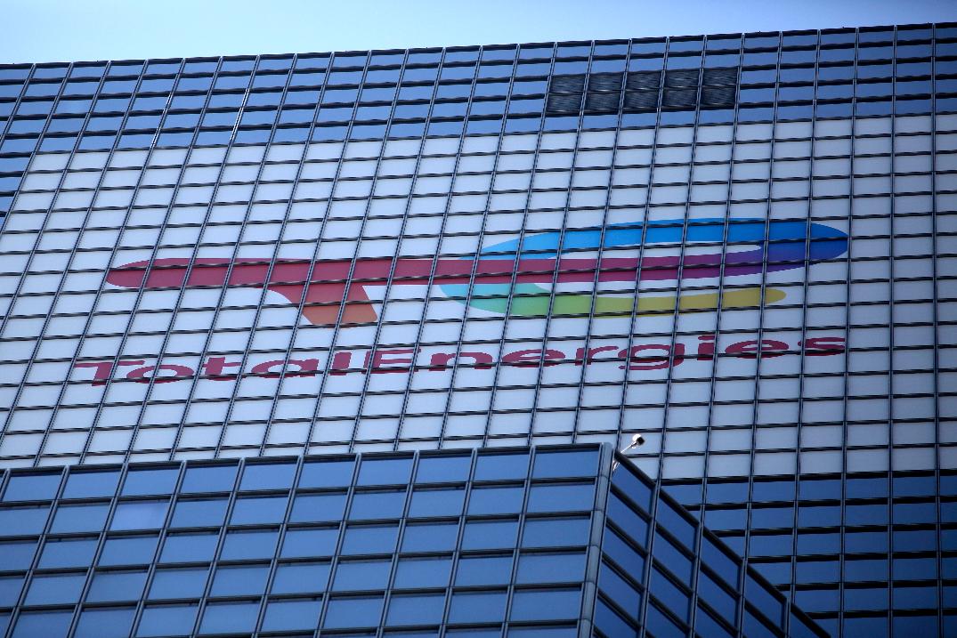 FILE - The logo of the 187-meters (613-foot) TotalEnergies headquarters tower is pictured in La Defense business district outside Paris, Tuesday, Sept.7, 2021. France's TotalEnergies SE doubled its profits in 2022, joining other international oil and gas companies in fattening their bottom lines as high energy prices surged after Russia's invasion of Ukraine. Adjusted net income rose to $36.2 billion, up from $18.1 billion in 2021, the company said Wednesday Feb.8, 2023. (AP Photo/Rafael Yaghobzadeh, File)
