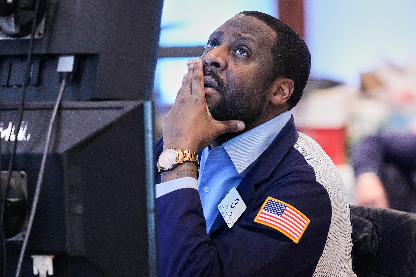Trader Aaron Ford works on the floor of the New York Stock Exchange, Thursday, May 7, 2026. (AP Photo/Richard Drew)