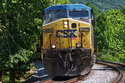 FILE - A CSX freight pulls through Ohiopyle, Pa., Aug. 19, 2025. (AP Photo/Gene J. Puskar, File)