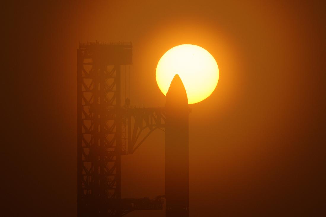 The sun rises behind SpaceX's mega rocket Starship as it is prepared for a test flight from Starbase, Texas, Friday, July 24, 2026. (AP Photo/Eric Gay)