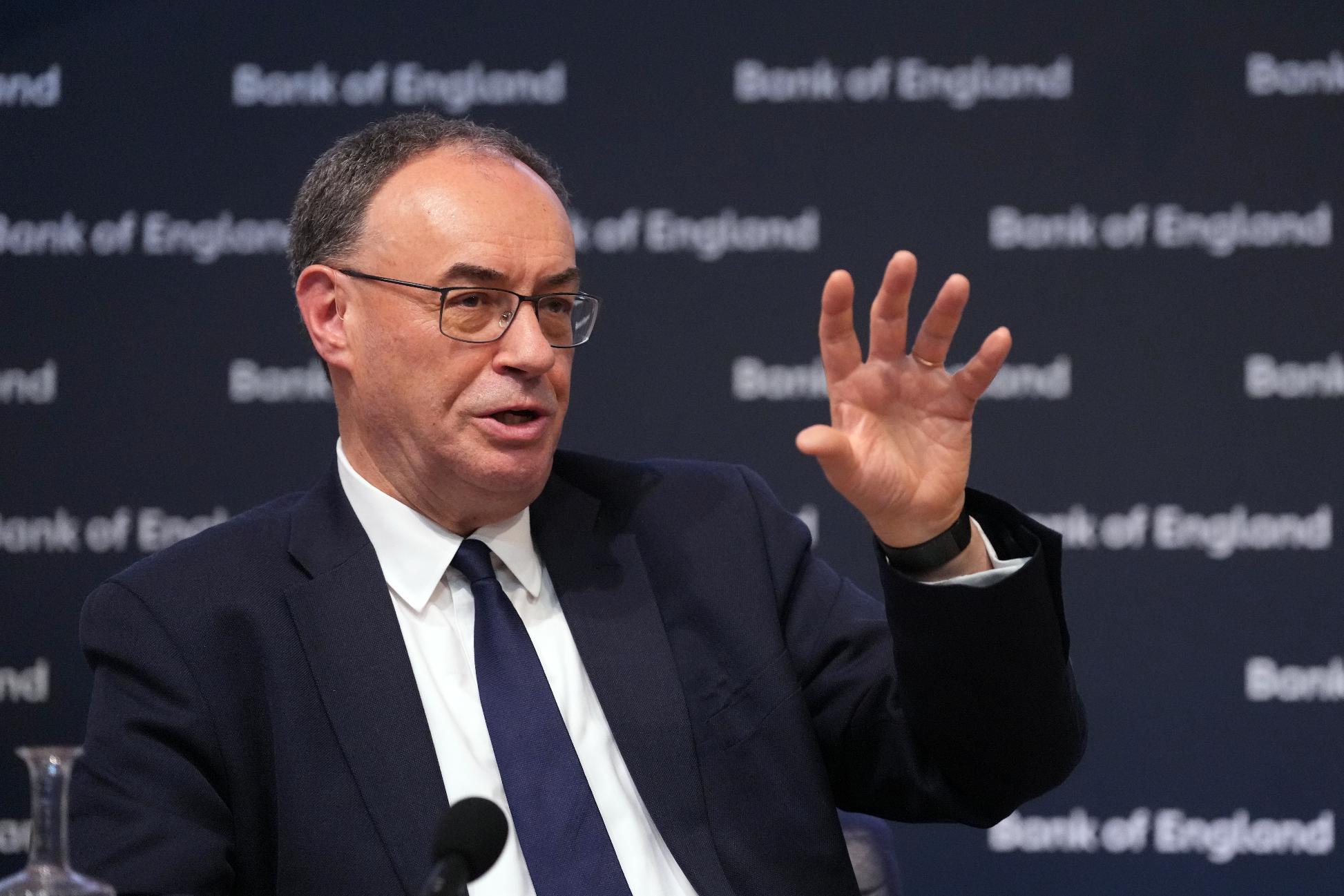 Bank of England Governor Andrew Bailey gestures as he speaks during the Monetary Policy Report Press Conference at the Bank of England in London, Thursday, April 30, 2026. (AP Photo/Kirsty Wigglesworth, Pool)