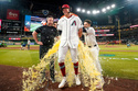 Arizona Diamondbacks' Jose Fernandez gets a gatorade bath after hitting two home runs and four RBI's in his first major league baseball game against the Detroit Tigers Tuesday, March 31, 2026, in Phoenix. (AP Photo/Darryl Webb)