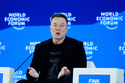 Elon Musk attends the Annual Meeting of the World Economic Forum in Davos, Switzerland, Thursday, Jan. 22, 2026. (AP Photo/Markus Schreiber)