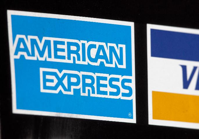 FILE - In this March 19, 2012 file photo, a sign for American Express is shown in New York. American Express reports their earnings on Friday, Jan. 26, 2024. (AP Photo/Mark Lennihan, File)