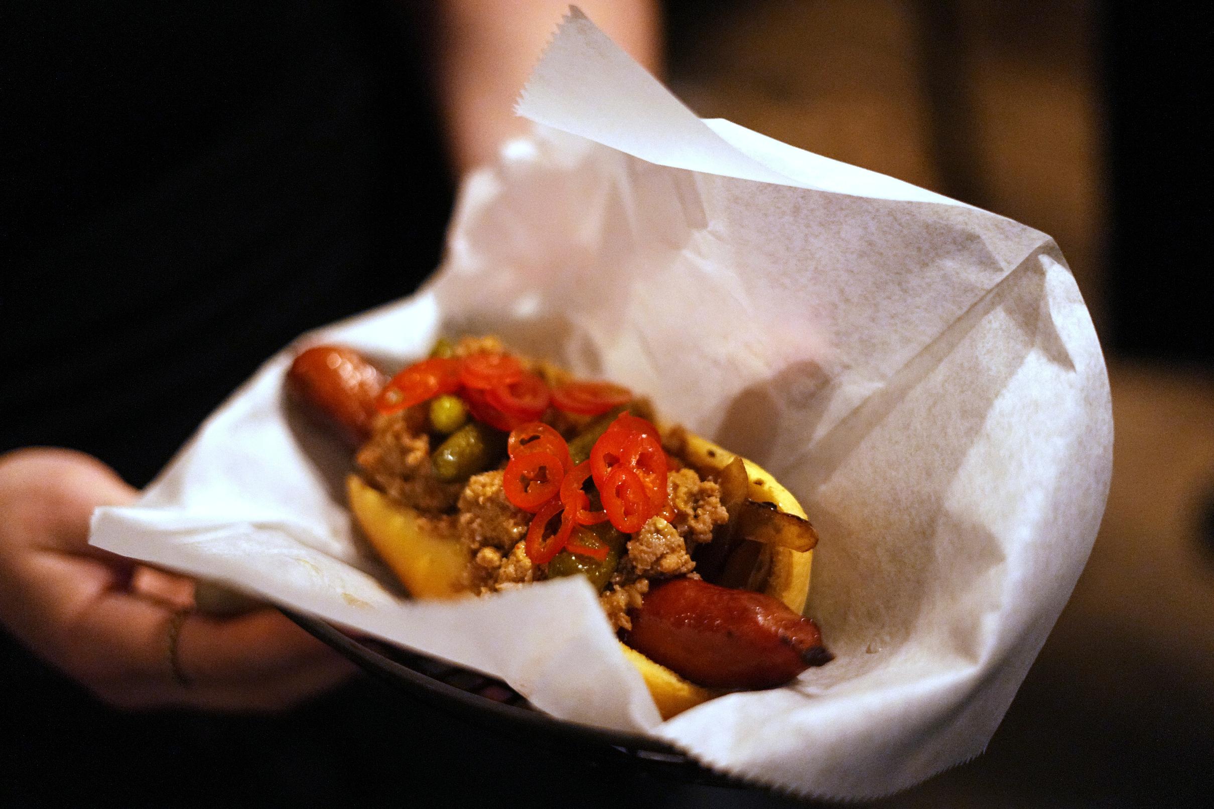 Shown is the The Cambodian Chili Dog at the Mawn restaurant in Philadelphia, Thursday, May 22, 2025. (AP Photo/Matt Rourke)
