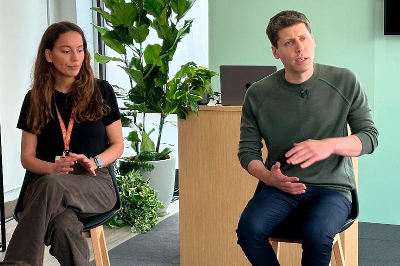 FILE - Sam Altman, right, CEO of ChatGPT maker OpenAI, and Mira Murati, chief technology officer, appear at OpenAI DevDay, OpenAI's first developer conference, on Nov. 6, 2023 in San Francisco. (AP Photo/Barbara Ortutay, File)