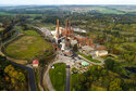 FILE - A brief patch of early morning sunlight brightens the landscape around the Greenidge Generation power plant, Oct. 15, 2021, in Dresden, N.Y. State officials on Thursday, June, 30, 2022, denied air permit renewals to a bitcoin-mining power plant in Finger Lakes that environmentalists called a threat to New York's climate goals. (AP Photo/Julie Jacobson, File)