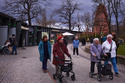 Monika Jansen, front left, and Christel Krueger, background center, take part in a guided tour for people with dementia organized by Malteser Deutschland, part of the international Catholic aid organization Malteser Order of Malta, at the Zoo in Berlin, Germany, Thursday, March 26, 2026. (AP Photo/Markus Schreiber)