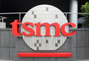 FILE - A Taiwan Semiconductor Manufacturing Co., Ltd. (TSMC) logo brands the headquarters in Hsinchu, Taiwan, Oct. 20, 2021. TSMC, the biggest contract manufacturer of processor chips for smartphones and other products. (AP Photo/Chiang Ying-ying, file)