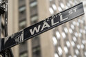 FILE - The New York Stock Exchange operates during normal business hours in the Financial District, Wednesday, Oct. 13, 2021, in the Manhattan borough of New York. Stocks are opening solidly in the green on Wall Street, Thursday, May 26, 2022, as investors applaud a strong set of quarterly results from Macy's and other retailers. (AP Photo/John Minchillo, File)