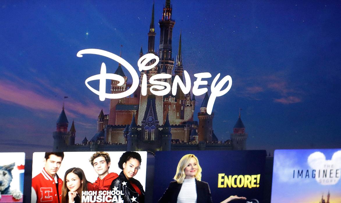 FILE - In this Nov. 13, 2019, photo, a Disney logo forms part of a menu for the Disney Plus movie and entertainment streaming service on a computer screen in Walpole, Mass. Disney reports earnings on Wednesday, Nov. 8, 2023. (AP Photo/Steven Senne, File)