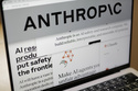 Pages from the Anthropic website and the company's logo are displayed on a computer screen in New York on Thursday, Feb. 26, 2026. (AP Photo/Patrick Sison)