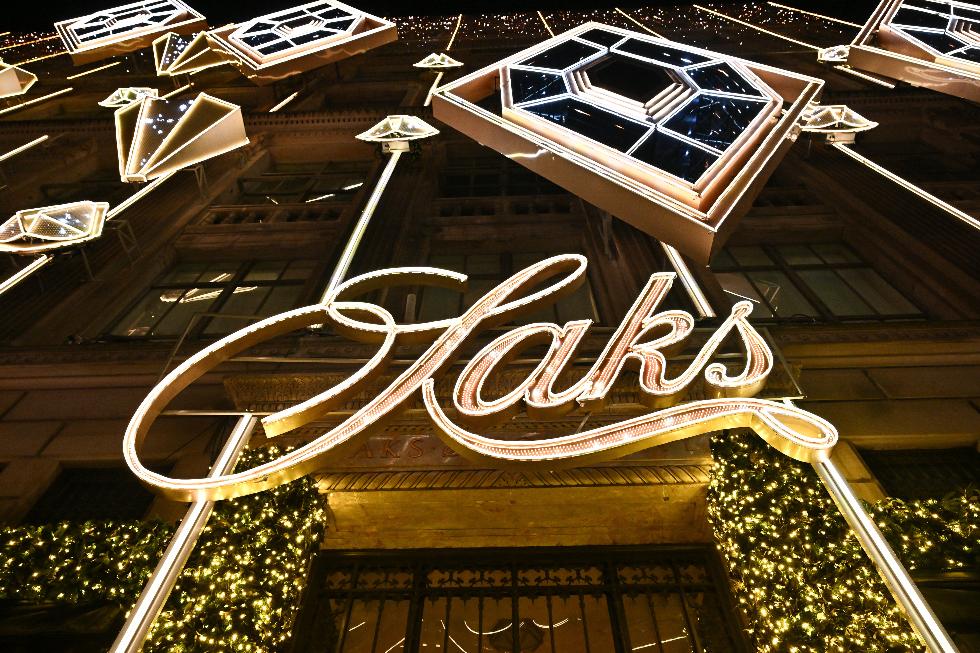 FILE - Holiday decorations are displayed during Saks Fifth Avenue's holiday light show and window reveal, Nov. 24, 2025, in New York. (Photo by Evan Agostini/Invision/AP, File)