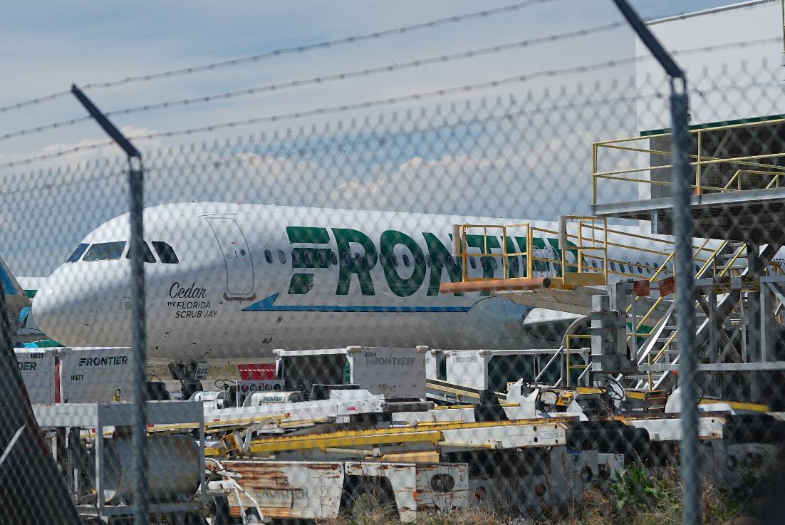 Frontier Airlines jetliner number n646fr sits outside the airlines technical operations center with other jetliners in for service north of Denver International Airport Saturday, May 9, 2026, in Denver. (AP Photo/David Zalubowski)