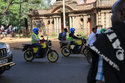 People ride electric motorcycles in Nairobi, Kenya, Thursday, Jan. 29, 2026. (AP Photo/Andrew Kasuku)