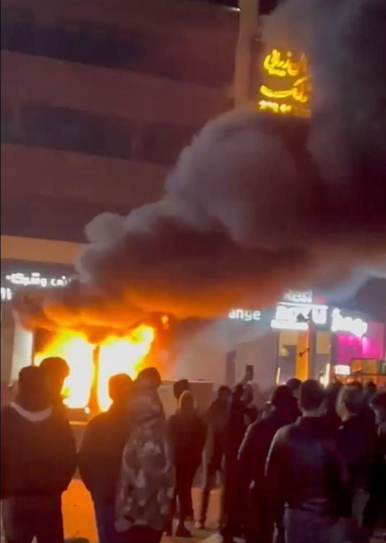 In this frame grab from video taken by an individual not employed by The Associated Press and obtained by the AP outside Iran shows a fire as people protest in Tehran, Iran, Friday, Jan. 9, 2026. (UGC via AP)