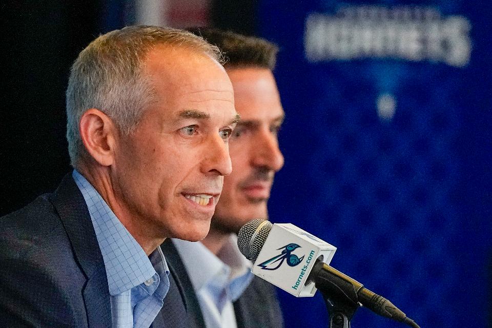 Rick Schnall, left, and Gabe Plotkin speak to the media during a news conference about the sale of the majority stake in the Charlotte Hornets NBA basketball team on Thursday, Aug. 3, 2023, in Charlotte, N.C. The sale of the majority stake of the Charlotte Hornets from six-time NBA champion Michael Jordan to Plotkin and Schnall has been finalized, the team announced Thursday. (AP Photo/Chris Carlson)