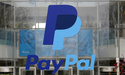 FILE - The PayPal logo hangs displayed outside their company headquarters, March 10, 2015, in San Jose, Calif. (AP Photo/Jeff Chiu, File)
