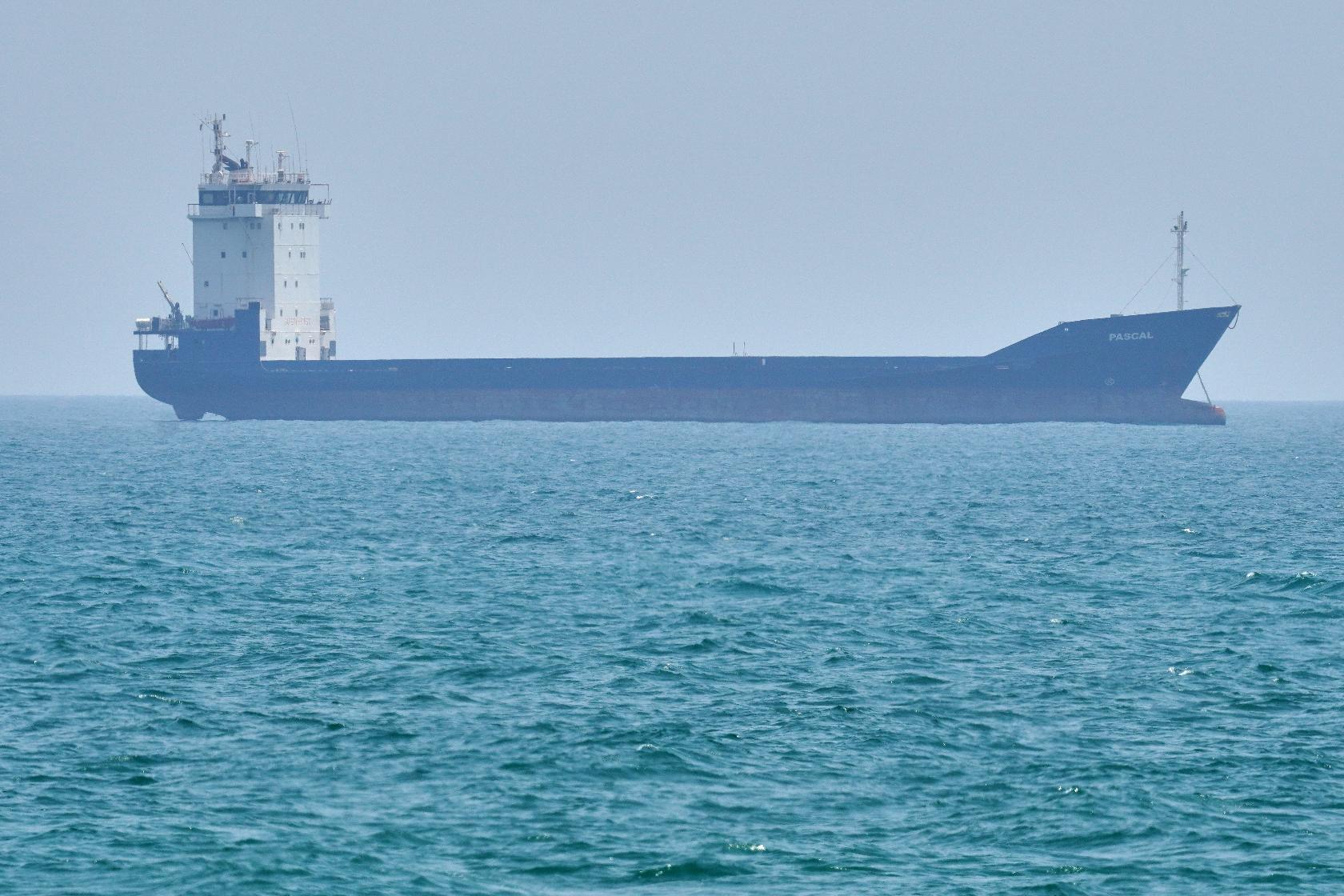 A tanker sits anchored in the Strait of Hormuz off the coast of Qeshm Island, Iran, Saturday, April 18, 2026. (AP Photo/Asghar Besharati)