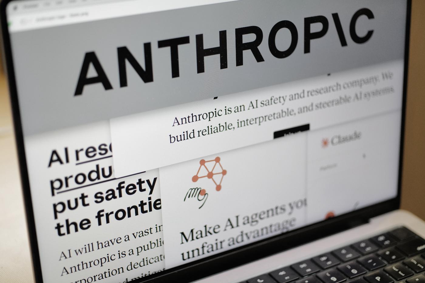 Pages from the Anthropic website and the company's logo are displayed on a computer screen in New York on Thursday, Feb. 26, 2026. (AP Photo/Patrick Sison)