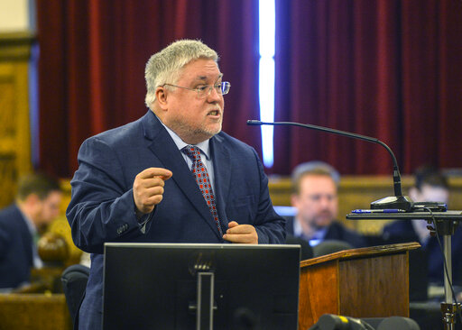 Attorney General for the State of West Virginia Patrick Morrisey gives opening arguments Monday, April 4, 2022. on the first day of the trial against Janssen Pharmaceuticals Inc., Teva Pharmaceuticals Inc., Allergan and their family of companies accused of misrepresenting the risks and benefits of opioids, in the Kanawha County Courthouse in Charleston, W.Va. (Kenny Kemp/Charleston Gazette-Mail via AP)