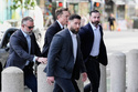 Elon Musk, center rear, arrives for a Twitter shareholder trial at the U.S. District Court for the Northern District of California, Wednesday, March 4, 2026, in San Francisco. (AP Photo/Godofredo A. Vásquez)