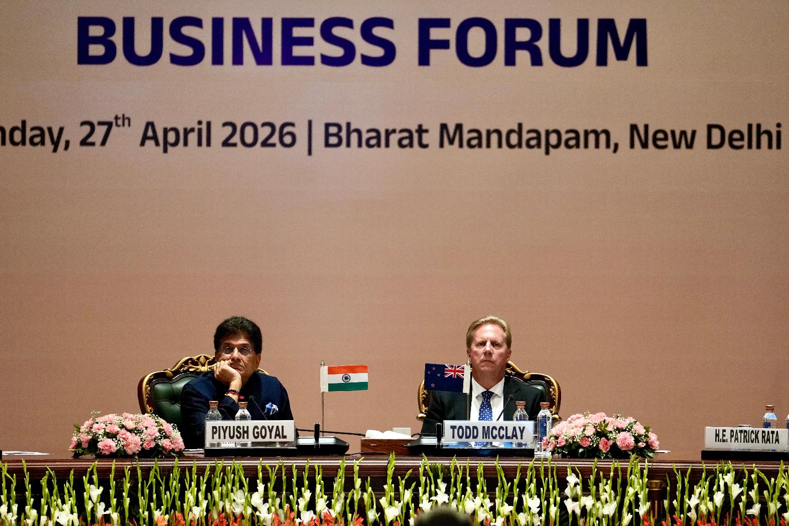 New Zealand Trade Minister Todd McClay, right, sits next to Indian Commerce Minister Piyush Goyal during the India New Zealand Free Trade Agreement signing ceremony and Business forum meeting in New Delhi, India, Monday, April 27, 2026. ( AP Photo/Manish Swarup)