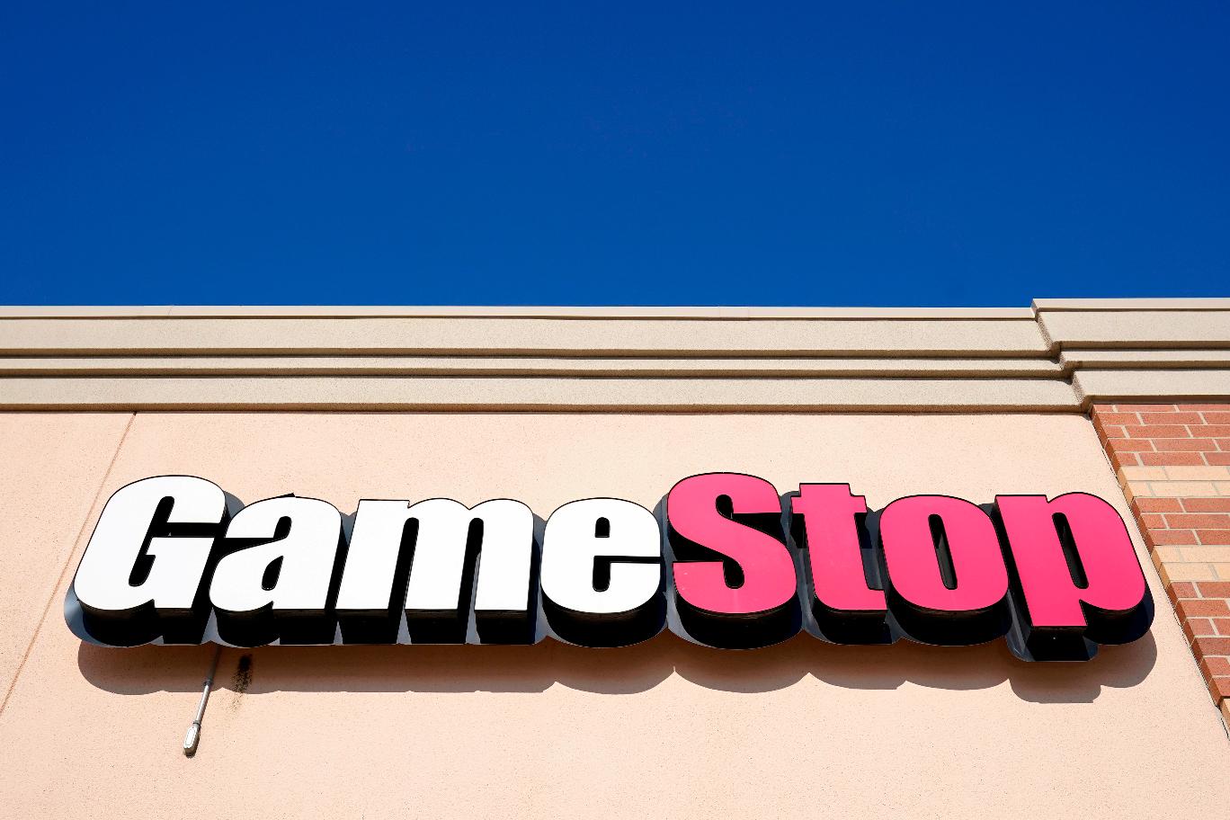 FILE - A GameStop sign is displayed above a store in Urbandale, Iowa, on Jan. 28, 2021. (AP Photo/Charlie Neibergall, File)