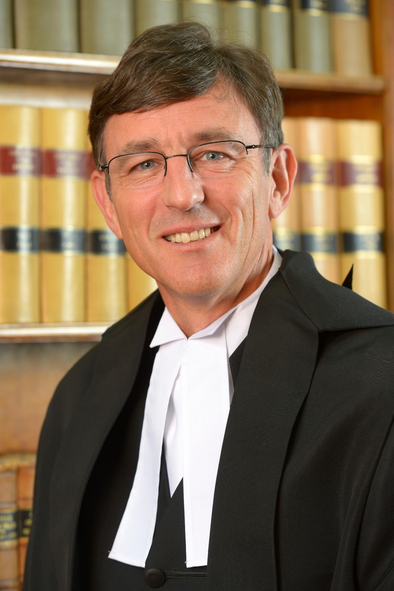 In this undated photo provided by the Supreme Court of Victoria, Justice James Elliott poses in Melbourne, Australia. (Supreme Court of Victoria via AP)
