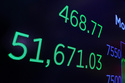 A board above the New York Stock Exchange trading floor displays the closing number for the Dow Jones industrial averge, Monday, June 15, 2026. (AP Photo/Richard Drew)