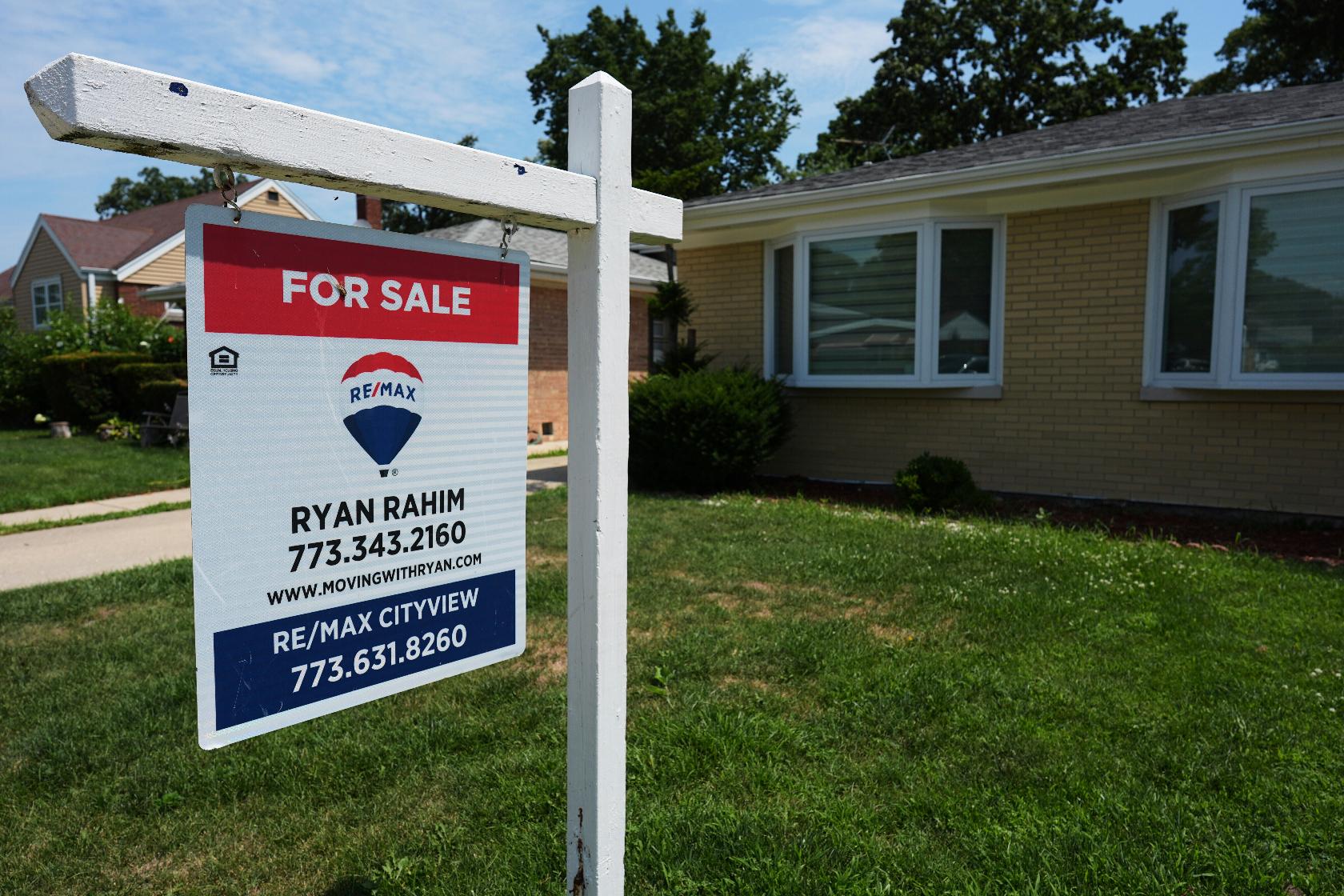 FILE - For Sale sign is displayed in Skokie, Ili., July 24, 2025. (AP Photo/Nam Y. Huh, File)