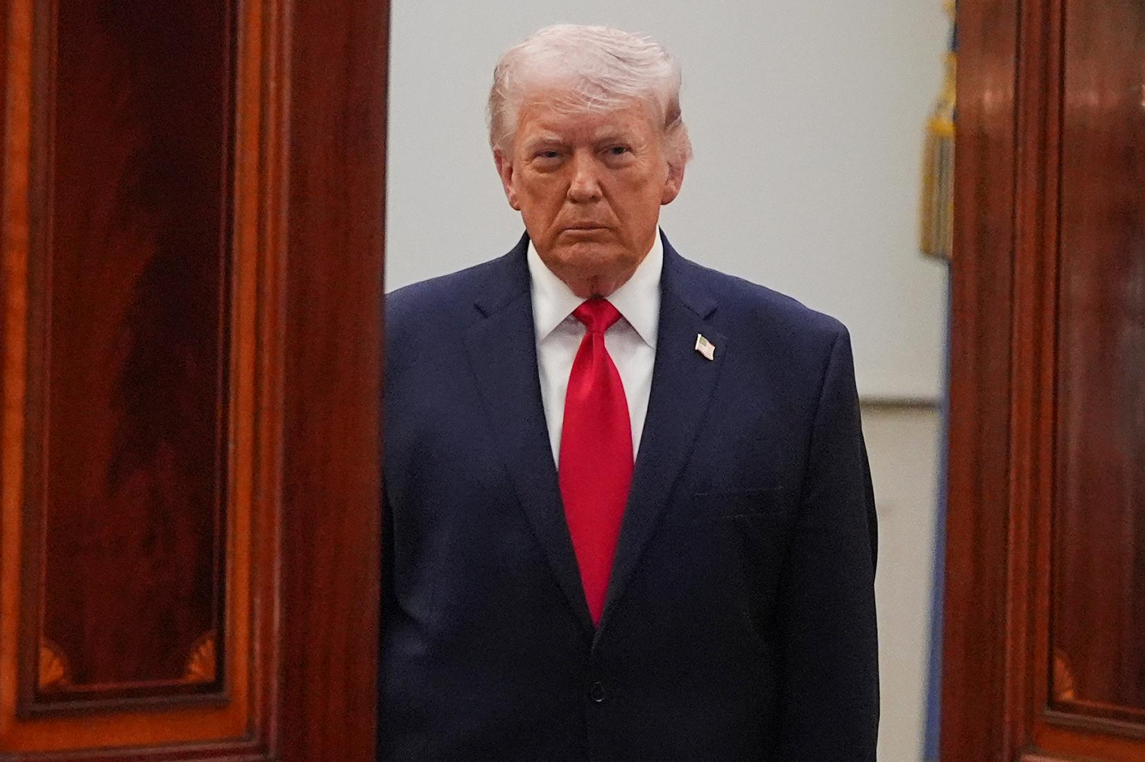 President Donald Trump arrives from the Blue Room to speak about the Iran war from the Cross Hall of the White House on Wednesday, April 1, 2026, in Washington. (AP Photo/Alex Brandon, Pool)