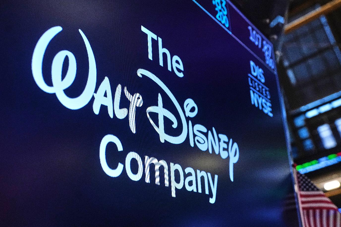 FILE - The logo for The Walt Disney Company is displayed above a trading post on the floor of the New York Stock Exchange, Monday, Feb. 2, 2026. (AP Photo/Richard Drew, File)