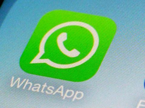 FILE - This Feb. 19, 2014, file photo, shows WhatsApp app icon on a smartphone in New York. (AP Photo/Patrick Sison, File)