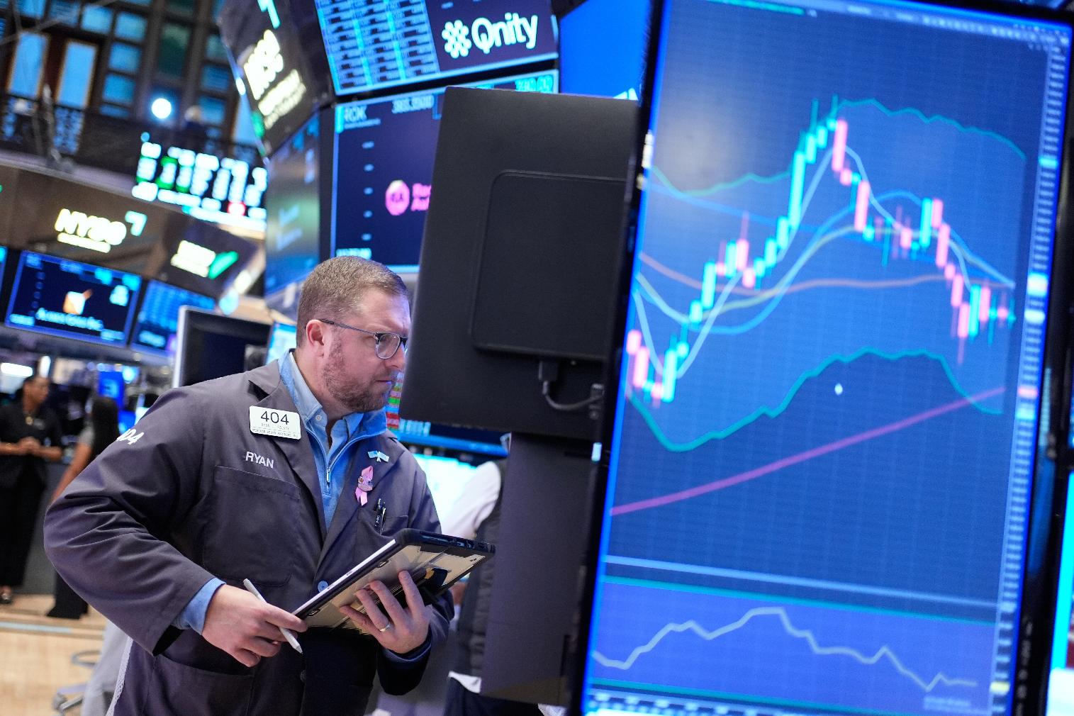 Ryan Falvey works on the floor at the New York Stock Exchange in New York, Thursday, March 5, 2026. (AP Photo/Seth Wenig)