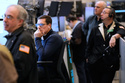 Traders work on the floor at the New York Stock Exchange in New York, Monday, March 2, 2026. (AP Photo/Seth Wenig)