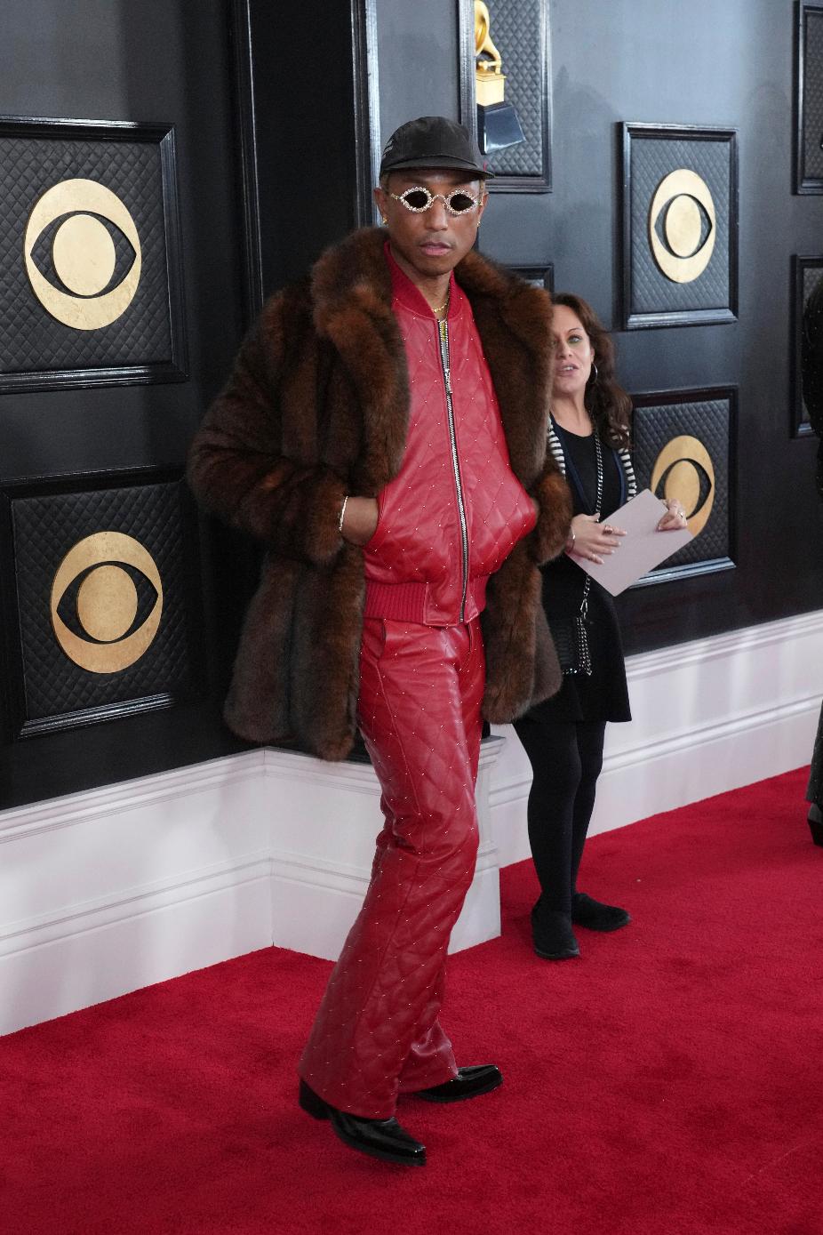 Pharrell Williams, left, and Helen Lasichanh arrive at the 65th annual Grammy Awards on Sunday, Feb. 5, 2023, in Los Angeles. (Photo by Jordan Strauss/Invision/AP)