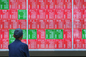 A person looks at an electronic stock board showing Japan's Nikkei index at a securities firm Monday, May 25, 2026, in Tokyo. (AP Photo/Eugene Hoshiko)