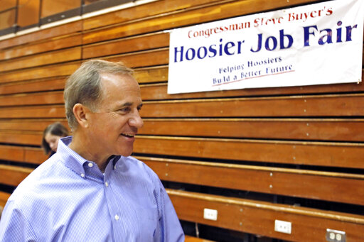 FILE — Indiana Congressman Stephen Buyer talks during a Hoosier Job Fair, July 19, 2010, at Jefferson High School in Lafayette, Ind. The former U.S. congressman from Indiana, technology company executives and an investment banker are among nine people charged in four separate and unrelated insider trading schemes. The charges were announced Monday, July 25, 2022 in Manhattan. (Michael Heinz/Journal &amp; Courier via AP)