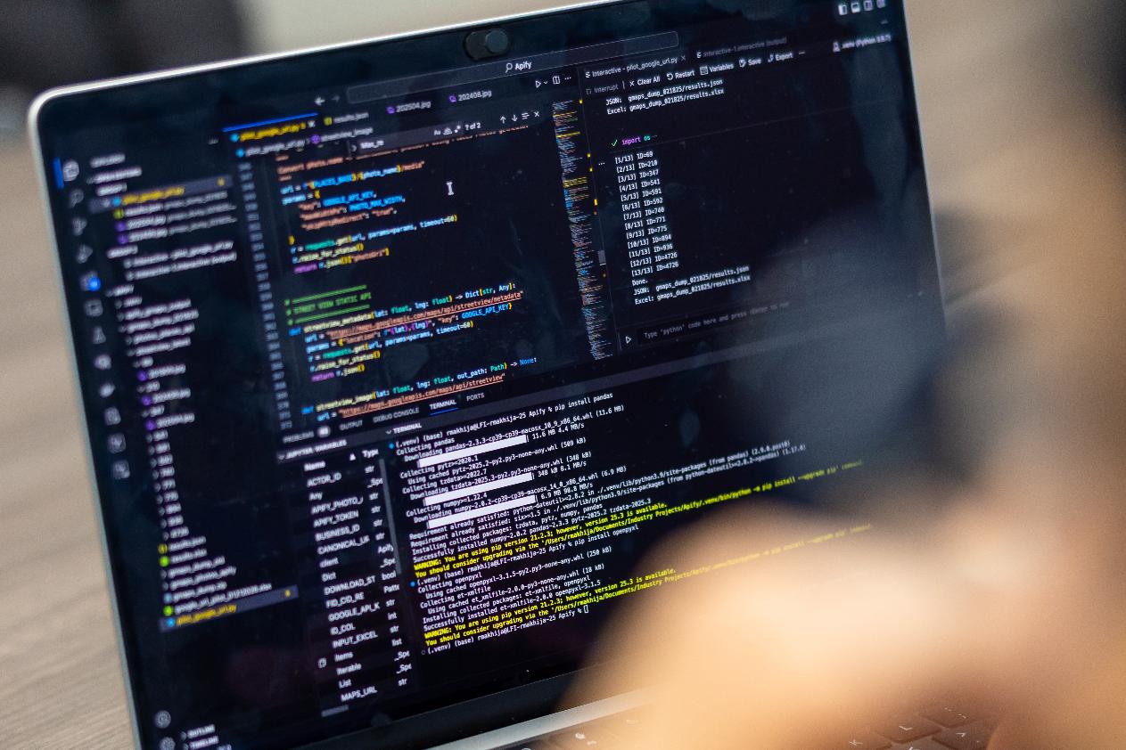 Programming used for an analysis of South Bend's 311 on a screen during a demonstration Thursday, Feb. 19, 2026, at City Hall in South Bend, Ind. (AP Photo/Michael Caterina)