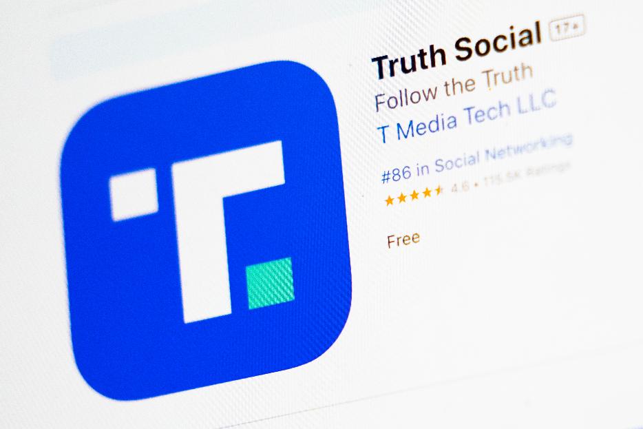 FILE - The download screen for the Truth Social app is displayed on a laptop computer, March 20, 2024, in New York. (AP Photo/John Minchillo, File)