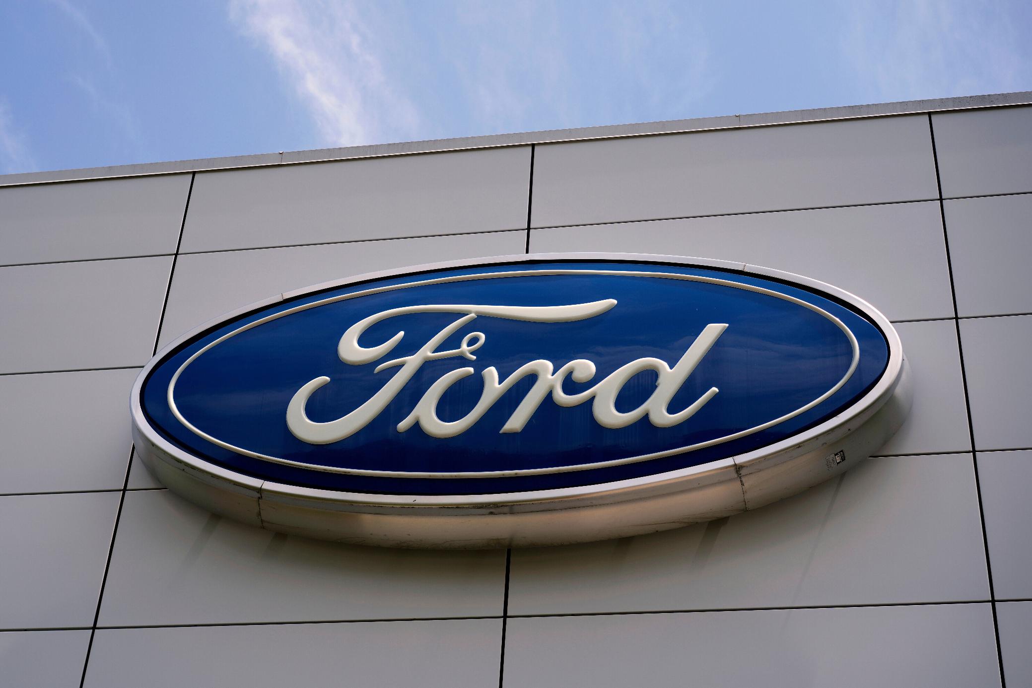 FILE - The Ford logo is displayed above the entrance to the Ford Motor Company Kentucky Truck Plant, Wednesday, April 30, 2025, in Louisville, Ky. (AP Photo/Carolyn Kaster, File)