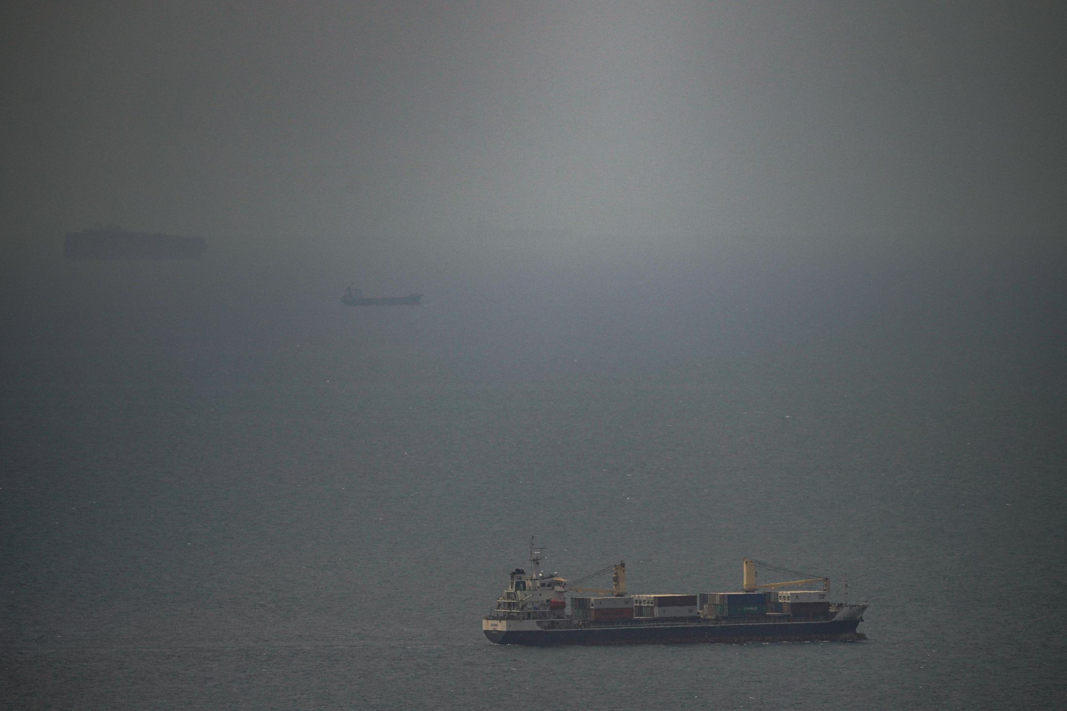 A cargo ship sails in the Persian Gulf toward the Strait of Hormuz, Wednesday, April 22, 2026. (AP Photo)