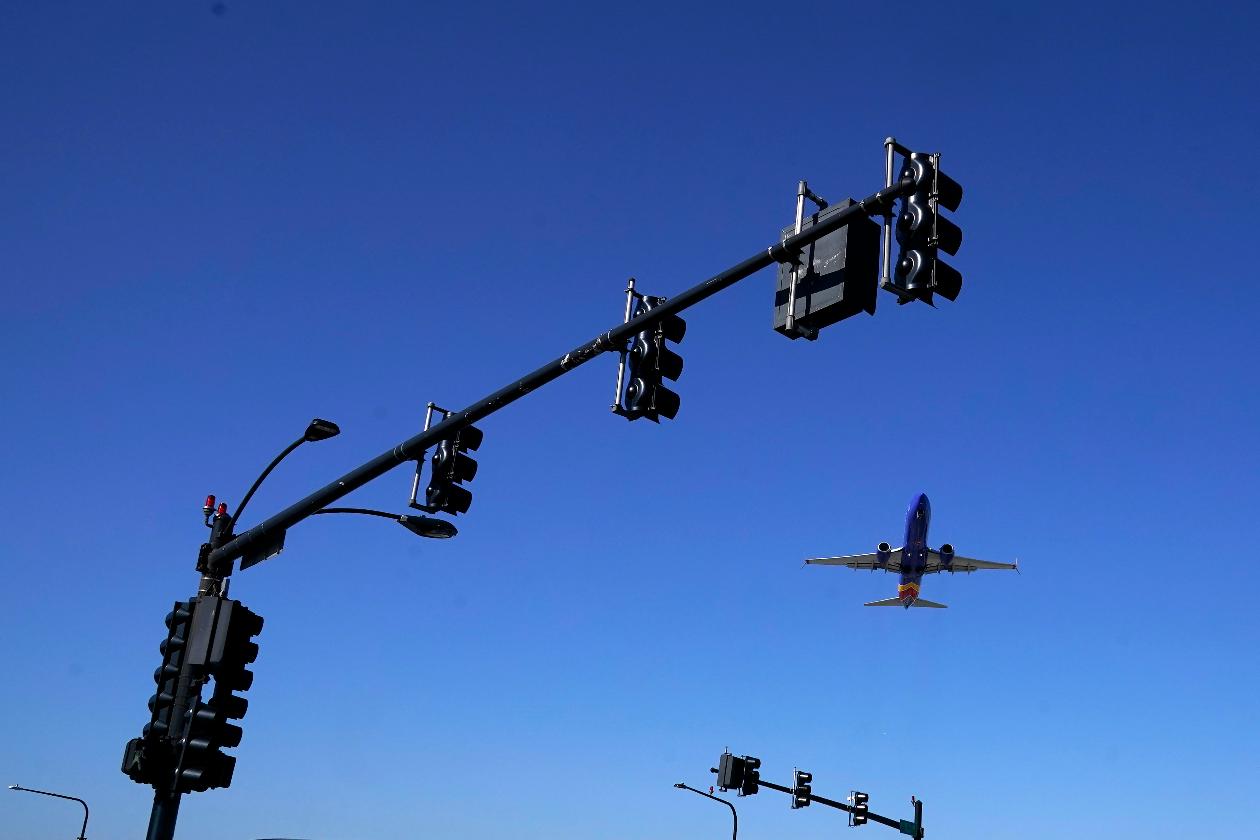 FILE - A flight departs Chicago's Midway International Airport on Memorial Day, Friday, May 26, 2023, in Chicago. The Treasury Department on Friday, Dec. 15, issued long-awaited guidance around tax credits for aviation fuel that reduces emissions of greenhouse gases compared with conventional fuel. (AP Photo/Charles Rex Arbogast, File)
